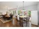 Formal dining room with a large table and chairs, hardwood floors, and chandelier at 3336 Toomer Kiln Cir, Mount Pleasant, SC 29466