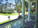 Front porch view of charming neighborhood street at 3336 Toomer Kiln Cir, Mount Pleasant, SC 29466