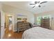 Bright bedroom featuring hardwood floors and a ceiling fan at 3336 Toomer Kiln Cir, Mount Pleasant, SC 29466