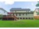 Large backyard with deck and green lawn at 3336 Toomer Kiln Cir, Mount Pleasant, SC 29466