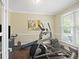 Bright home gym with elliptical, rowing machine, and weight bench at 3336 Toomer Kiln Cir, Mount Pleasant, SC 29466