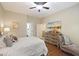 Spacious bedroom with hardwood floors and large window at 3336 Toomer Kiln Cir, Mount Pleasant, SC 29466