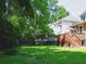 Spacious backyard with a large green lawn and wooden fence at 3336 Toomer Kiln Cir, Mount Pleasant, SC 29466