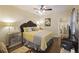 Bright bedroom with ceiling fan, large bed and ensuite bathroom access at 3336 Toomer Kiln Cir, Mount Pleasant, SC 29466