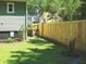 Side yard with a wooden fence and access gate at 3336 Toomer Kiln Cir, Mount Pleasant, SC 29466