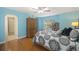 Bedroom with hardwood floors, wooden armoire, and a bed at 3336 Toomer Kiln Cir, Mount Pleasant, SC 29466