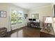 Home office with built-in desk and large window at 3336 Toomer Kiln Cir, Mount Pleasant, SC 29466