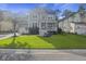 Two-story home with a charming front porch and landscaped yard at 3336 Toomer Kiln Cir, Mount Pleasant, SC 29466