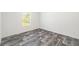 Empty bedroom with gray wood-look floors at 227 Koger Dr, Summerville, SC 29483