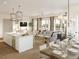 Open concept kitchen and dining area with spacious island and seating at 540 Helmsman St # 1232, Daniel Island, SC 29492