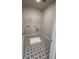 Laundry room with geometric tile floor and shelving at 127 Winding Grove Ln, Moncks Corner, SC 29461