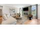 Spacious living room featuring a cozy fireplace and hardwood floors at 127 Winding Grove Ln, Moncks Corner, SC 29461