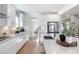 Modern kitchen with white cabinets, quartz countertops, and island at 127 Winding Grove Ln, Moncks Corner, SC 29461