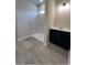 Bathroom with gray tile floor and a walk-in shower at 127 Winding Grove Ln, Moncks Corner, SC 29461