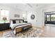 Bright bedroom with king-size bed and access to a screened porch at 3842 Delinger Dr, Mount Pleasant, SC 29466