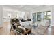 Open concept living room and kitchen with white cabinets and a large island at 3842 Delinger Dr, Mount Pleasant, SC 29466