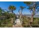 Wooden walkway from dock to private island, offering scenic views at 8871 Palmetto Rd # 33 Ac Private Island, Edisto Beach, SC 29438