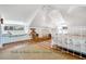 Built-in beds under vintage windows in a charming loft bedroom at 8871 Palmetto Rd # 33 Ac Private Island, Edisto Beach, SC 29438