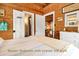 Primary bedroom with private bath, view into living area at 8871 Palmetto Rd # 33 Ac Private Island, Edisto Beach, SC 29438