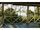 Screened porch offers tranquil marsh views and natural light at 8871 Palmetto Rd # 33 Ac Private Island, Edisto Beach, SC 29438