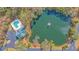 Aerial view of community pool and pond at 5565 Colonial Chatsworth Cir, North Charleston, SC 29418