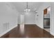 Hardwood floor dining room with kitchen and entry views at 5565 Colonial Chatsworth Cir, North Charleston, SC 29418