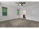 Bedroom with ceiling fan, neutral carpet, and en-suite bathroom at 5565 Colonial Chatsworth Cir, North Charleston, SC 29418