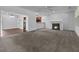 Living room with fireplace, open floor plan, and hardwood floors at 5565 Colonial Chatsworth Cir, North Charleston, SC 29418