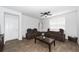 Living room with two brown leather recliners, a coffee table, and hardwood floors at 423 Cedarview Rd, Summerville, SC 29486