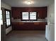 Cozy kitchen featuring wood cabinets and a window at 31 Hannibal Dr, Ridgeville, SC 29472