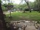 Relaxing firepit area with stone patio and wooden seating at 31 Hannibal Dr, Ridgeville, SC 29472