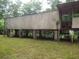 Elevated house with a large yard and mature trees at 31 Hannibal Dr, Ridgeville, SC 29472