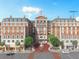 Elegant brick building with arched entryway and charming storefronts at 609 King St # 647, Charleston, SC 29403
