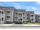 Gray building with white accents and multiple balconies at 18 W Mariners Cay Dr, Folly Beach, SC 29439