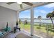 Enjoy water views from this relaxing screened porch, complete with ceiling fan at 18 W Mariners Cay Dr, Folly Beach, SC 29439