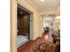 Elegant hallway with hardwood floors and an elevator at 5 Middle Atlantic Wharf # 3A, Charleston, SC 29401
