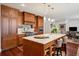 Gourmet kitchen features a large island, custom cabinetry, and high-end appliances at 5 Middle Atlantic Wharf # 3A, Charleston, SC 29401