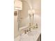 Spa-like bathroom with marble vanity and stylish lighting at 5 Middle Atlantic Wharf # 3A, Charleston, SC 29401