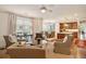 Open living area features comfortable seating and a ceiling fan at 5 Middle Atlantic Wharf # 3A, Charleston, SC 29401