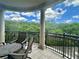 Enjoyable balcony featuring a table and chairs, perfect for outdoor dining or relaxation at 5 Middle Atlantic Wharf # 3A, Charleston, SC 29401