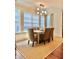 Elegant dining room with hardwood floors and ample natural light at 5 Middle Atlantic Wharf # 3A, Charleston, SC 29401