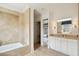 Bathroom with soaking tub and linen closet at 5 Middle Atlantic Wharf # 3A, Charleston, SC 29401