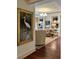 Bright living room with hardwood floors, comfortable seating, and artwork at 5 Middle Atlantic Wharf # 3A, Charleston, SC 29401