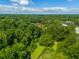 Aerial view showing a house nestled among trees at 220 Carolina Ave, Moncks Corner, SC 29461