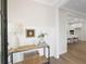 Bright entryway with white walls and a rustic console table at 108 Gray Pine Ln, Summerville, SC 29483