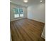 Versatile bonus room with wood-look flooring at 108 Gray Pine Ln, Summerville, SC 29483