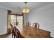 Dining room with wood table and chairs, window lighting at 203 Delafield Dr, Summerville, SC 29483