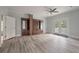Large bedroom with hardwood floors and French doors at 205 Valley St, Walterboro, SC 29488