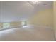 Spacious bedroom with sloped ceilings and carpet flooring at 205 Valley St, Walterboro, SC 29488