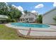 Inviting kidney-shaped pool with brick decking at 205 Valley St, Walterboro, SC 29488